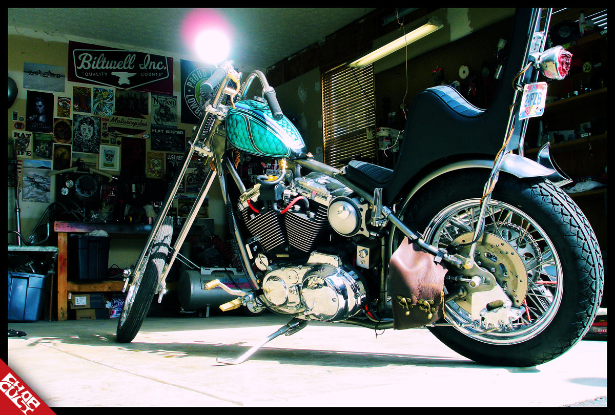 Chrome motorcycle b side in shop