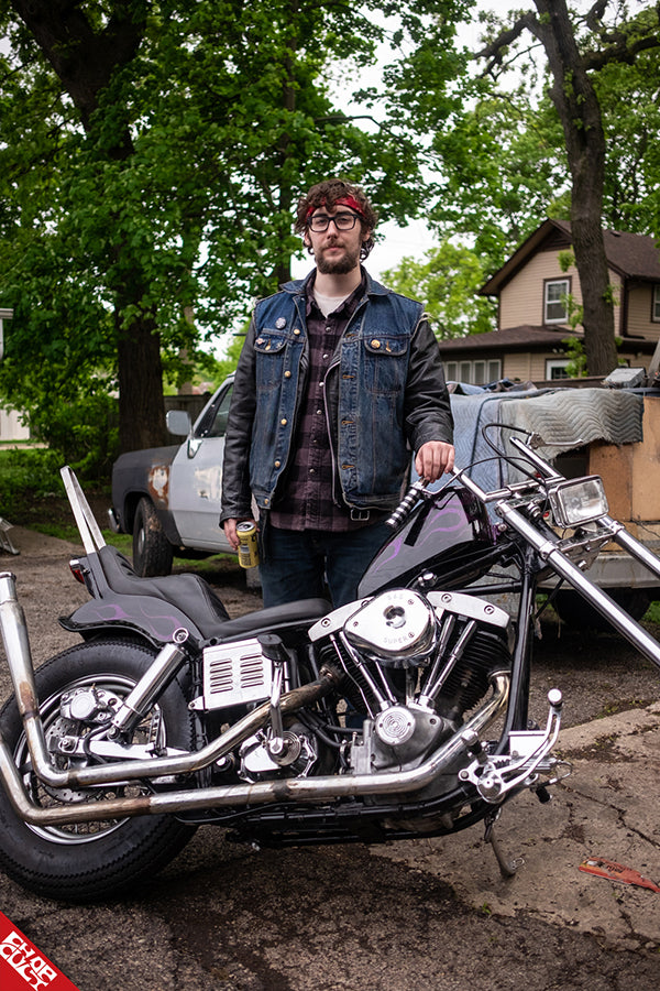 Andrew standing along side his bike
