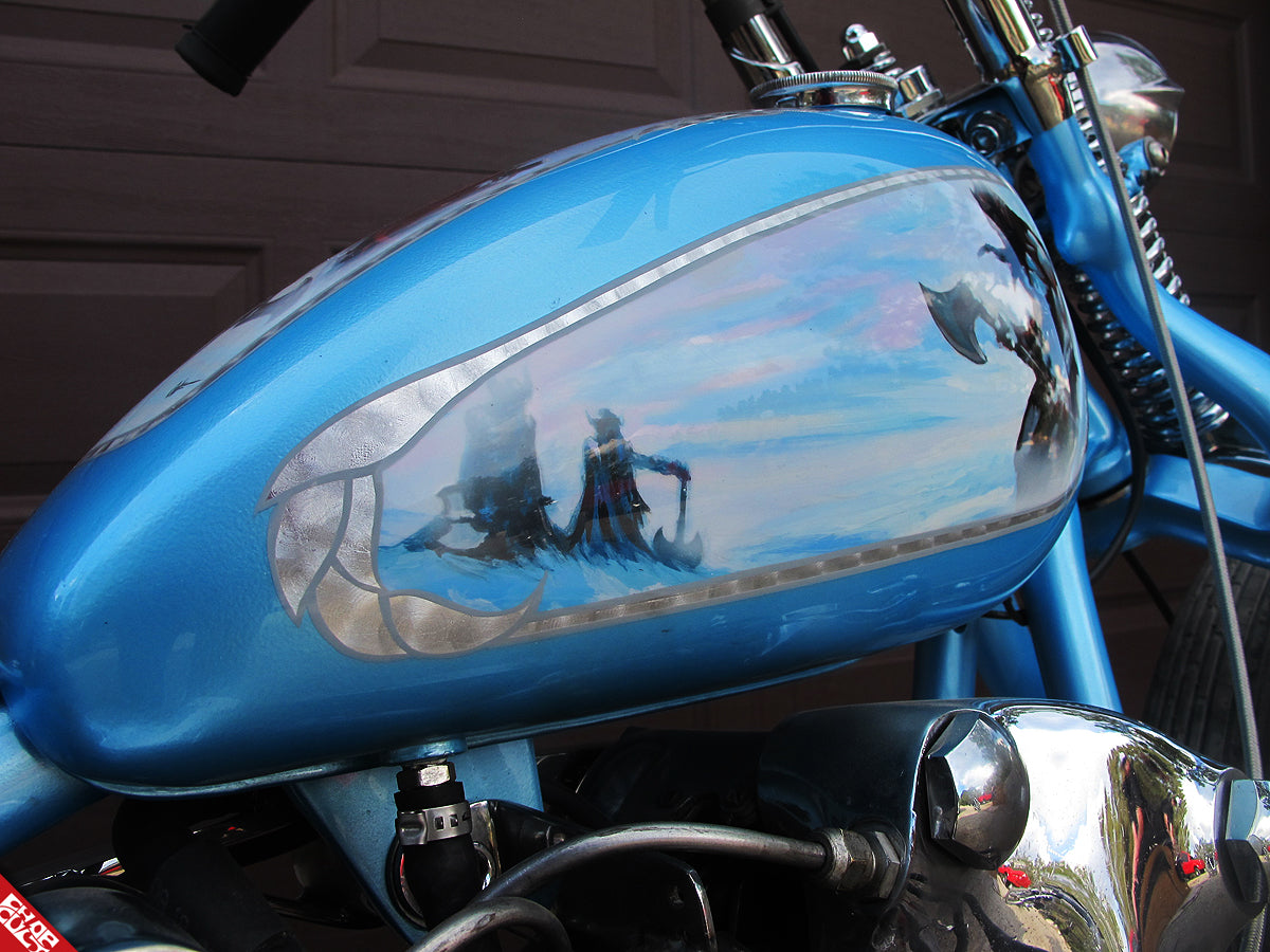 Blue motorcycle gas tank a side