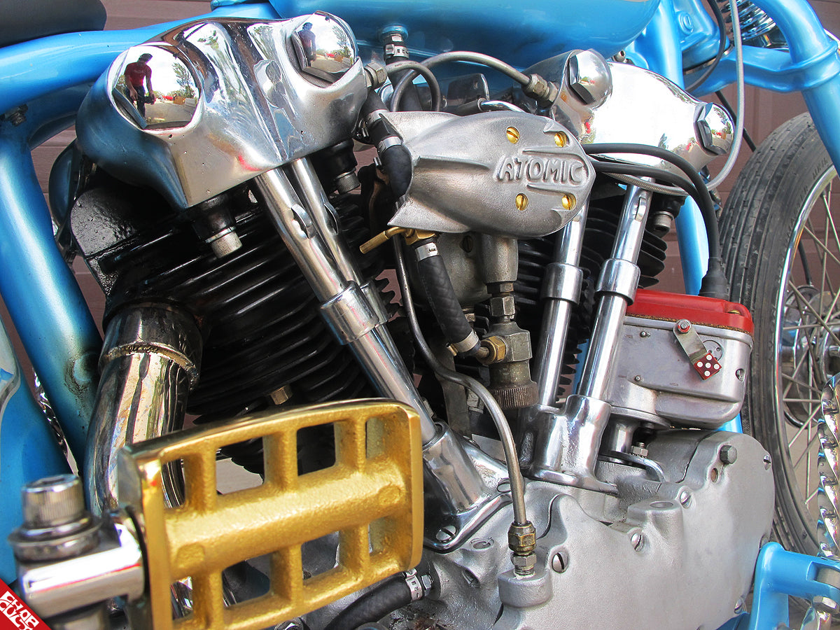 Blue motorcycle engine close up