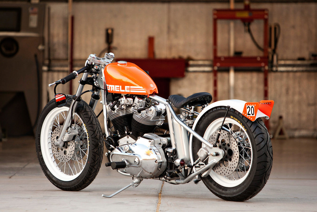 A full photo of the orange bike