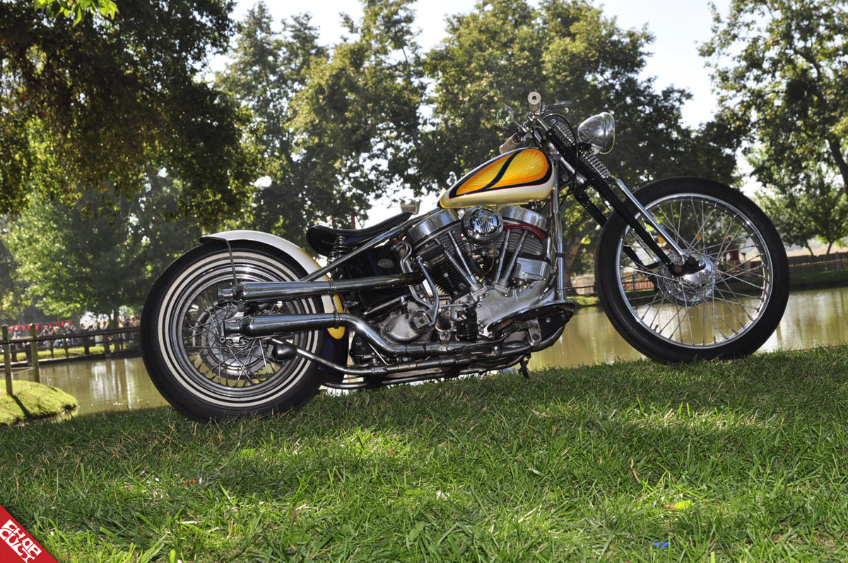 The right side of Cole's cream, yellow, and orange bike