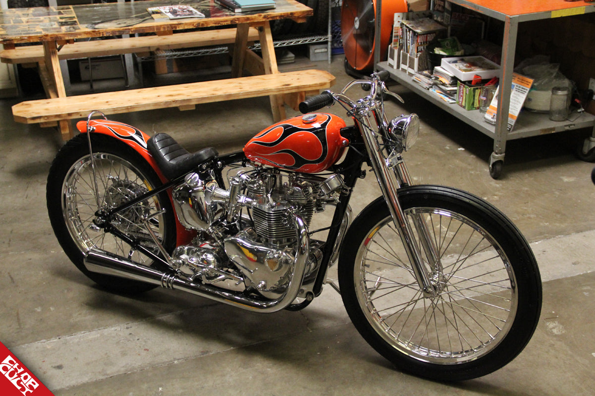 View of the entire orange bike