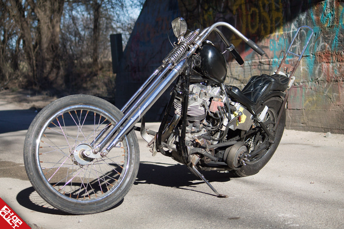 Custom shovelhead motorcycle on kickstand front angle