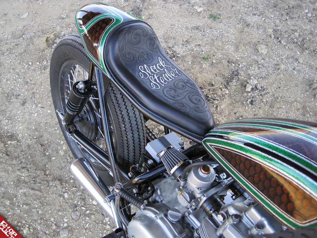 A close up view of the bike's finished seat with "Slack Stealer" embroidered on the seat