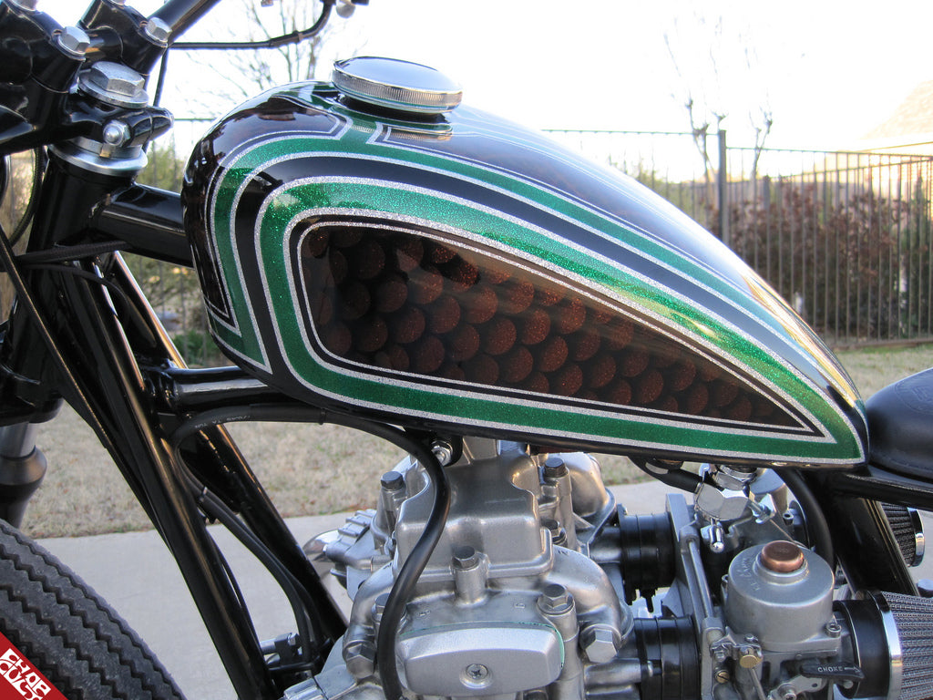 A close up of the paint on the fuel tank of the bike