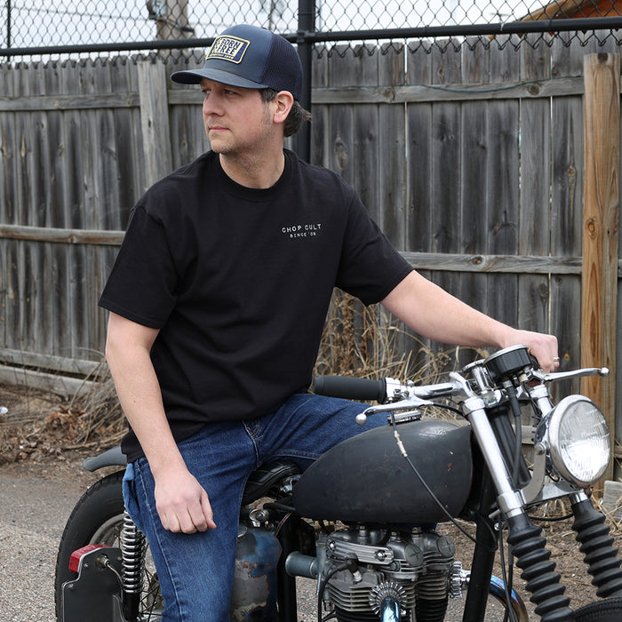 guy sitting on motorcycle
